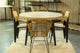 Mesa de comedor Redonda Berg en color negro, madera, metal, detalle — imagen 4