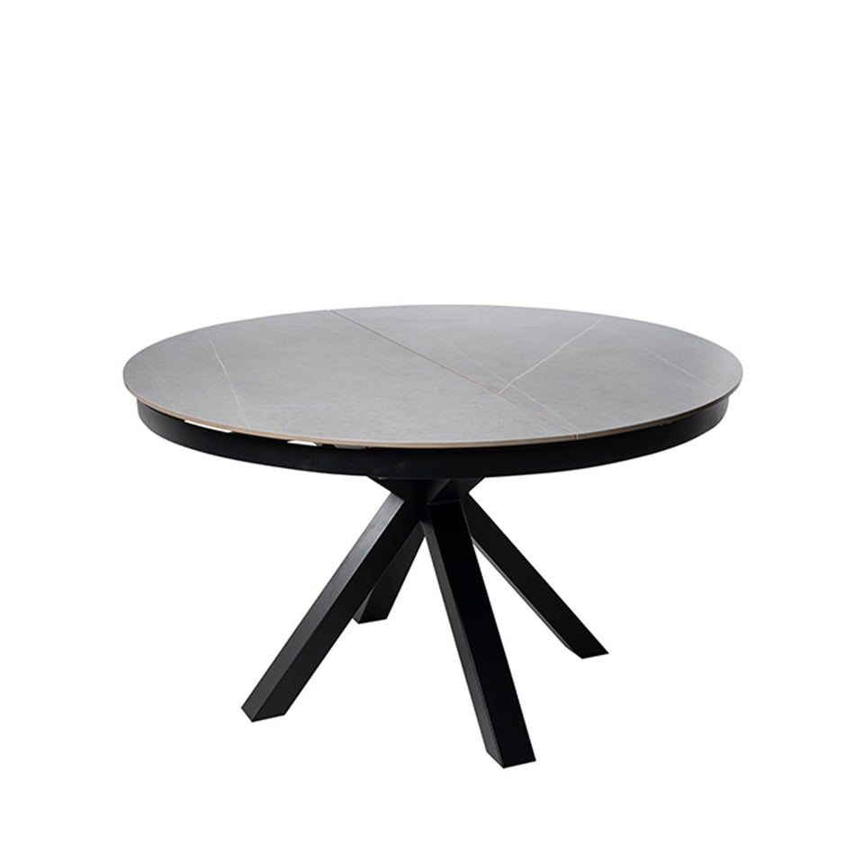Table à manger extensible Zuri, table à manger extensible en métal, vue en studio, ø130 × 76 cm de haut